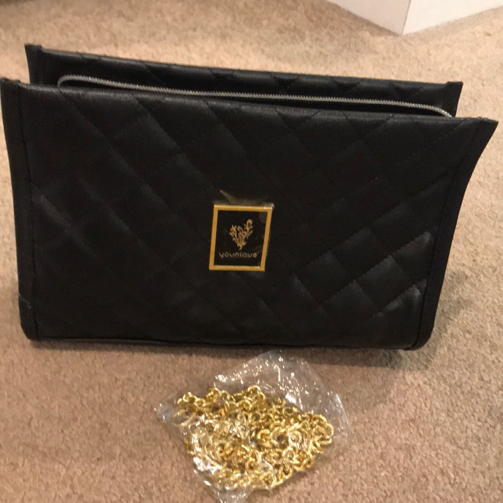 Younique purse/make up bag. Brand new!